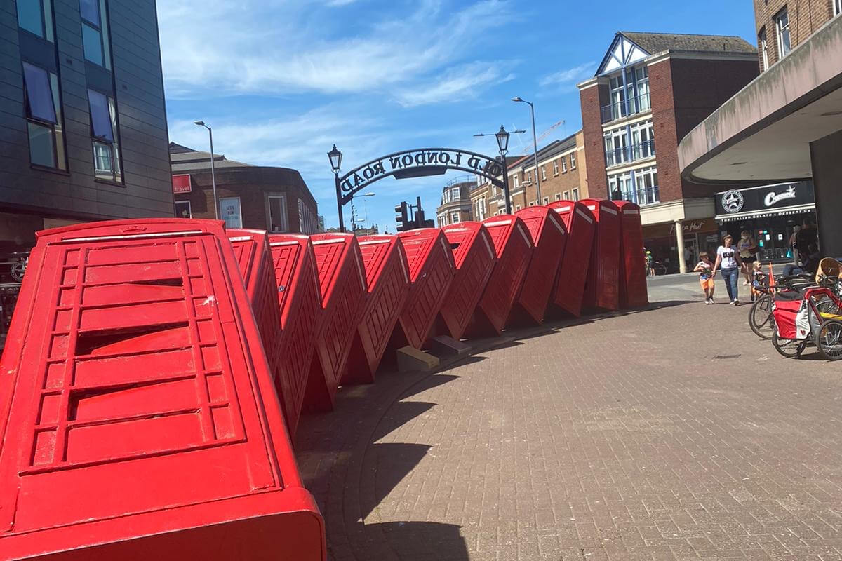 Kingston phone box leaning art