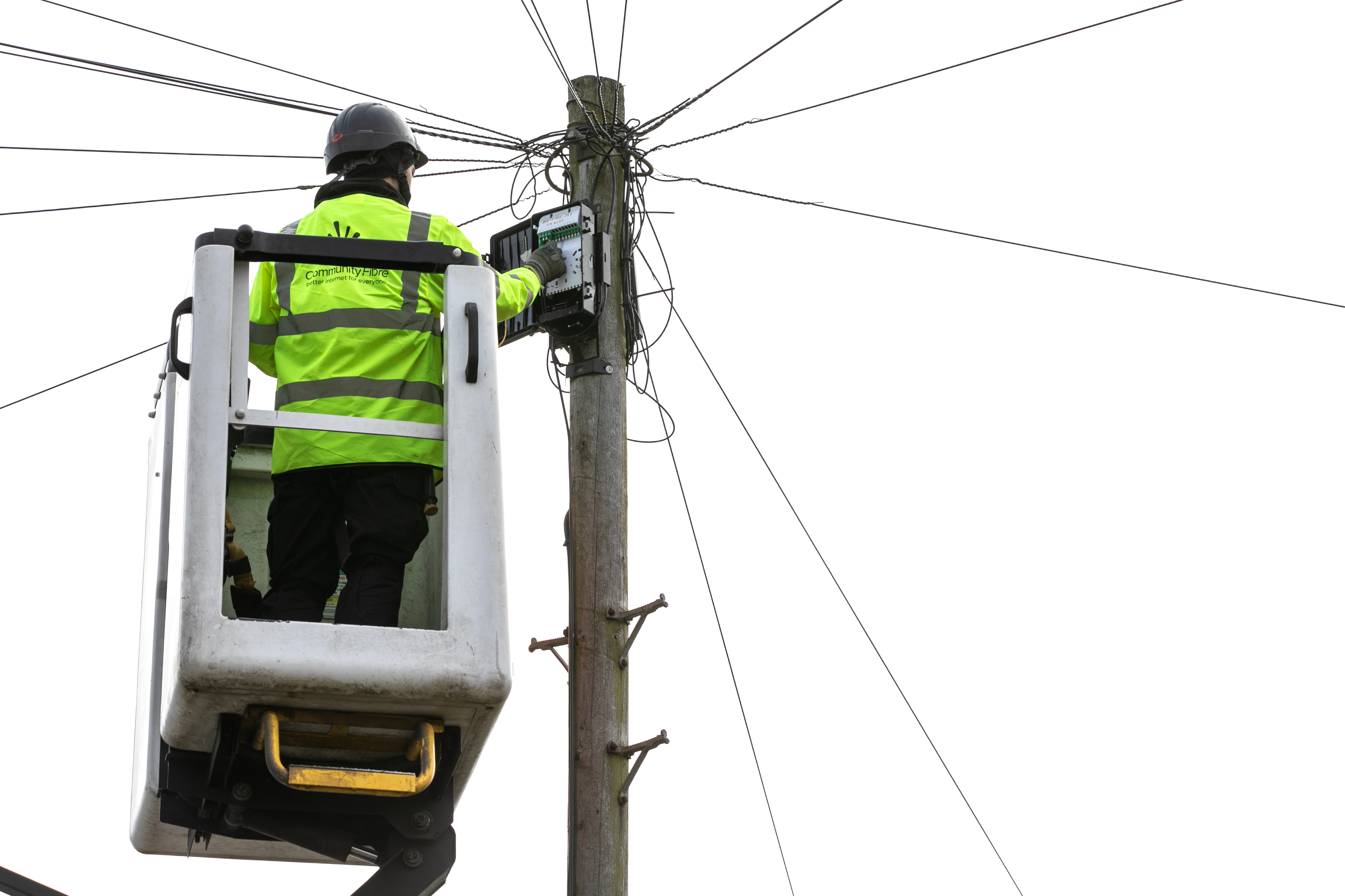 Technician installing fibre optic cables