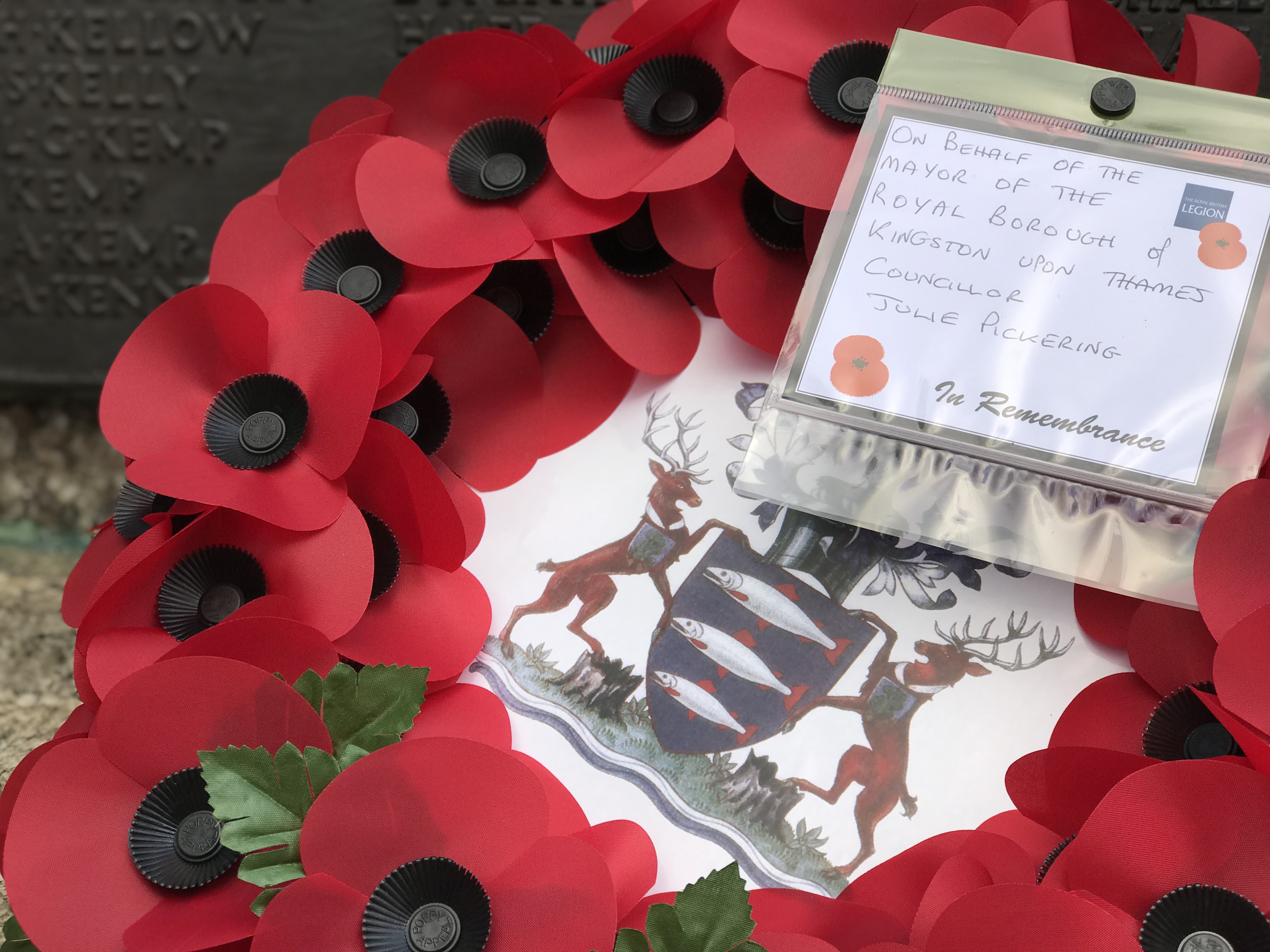 Images of a wreath at Remembrance Sunday 2018, signed by the then Mayor of Kingston