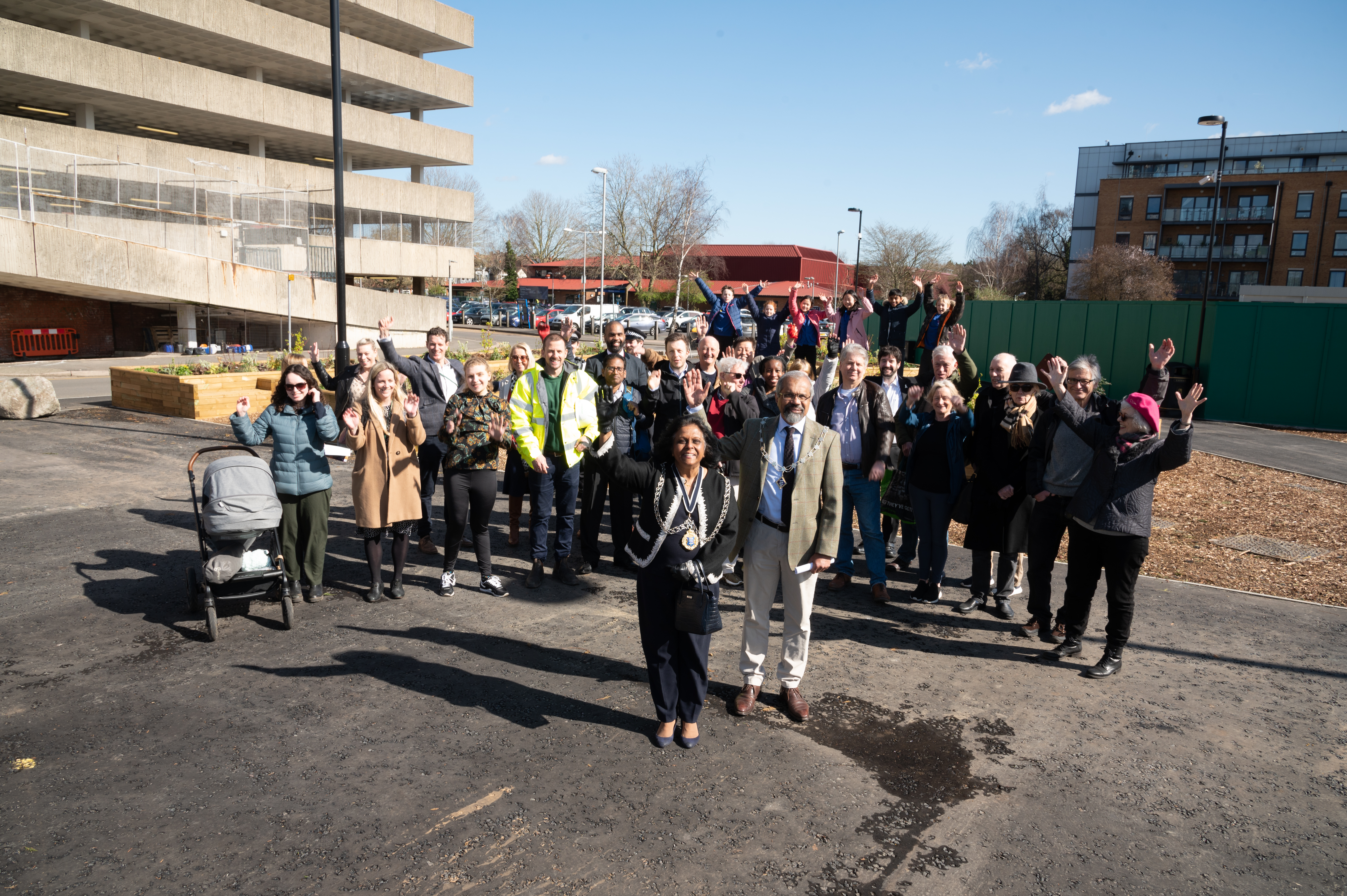 Councillors, students of Burlington School, members of the New Malden Partnership and police officers celebrating the opening of Jubilee Square in New Malden