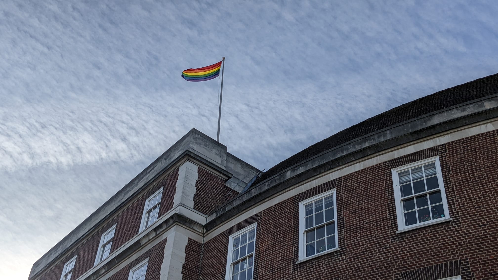 Rainbow flag flying over the Guildhall