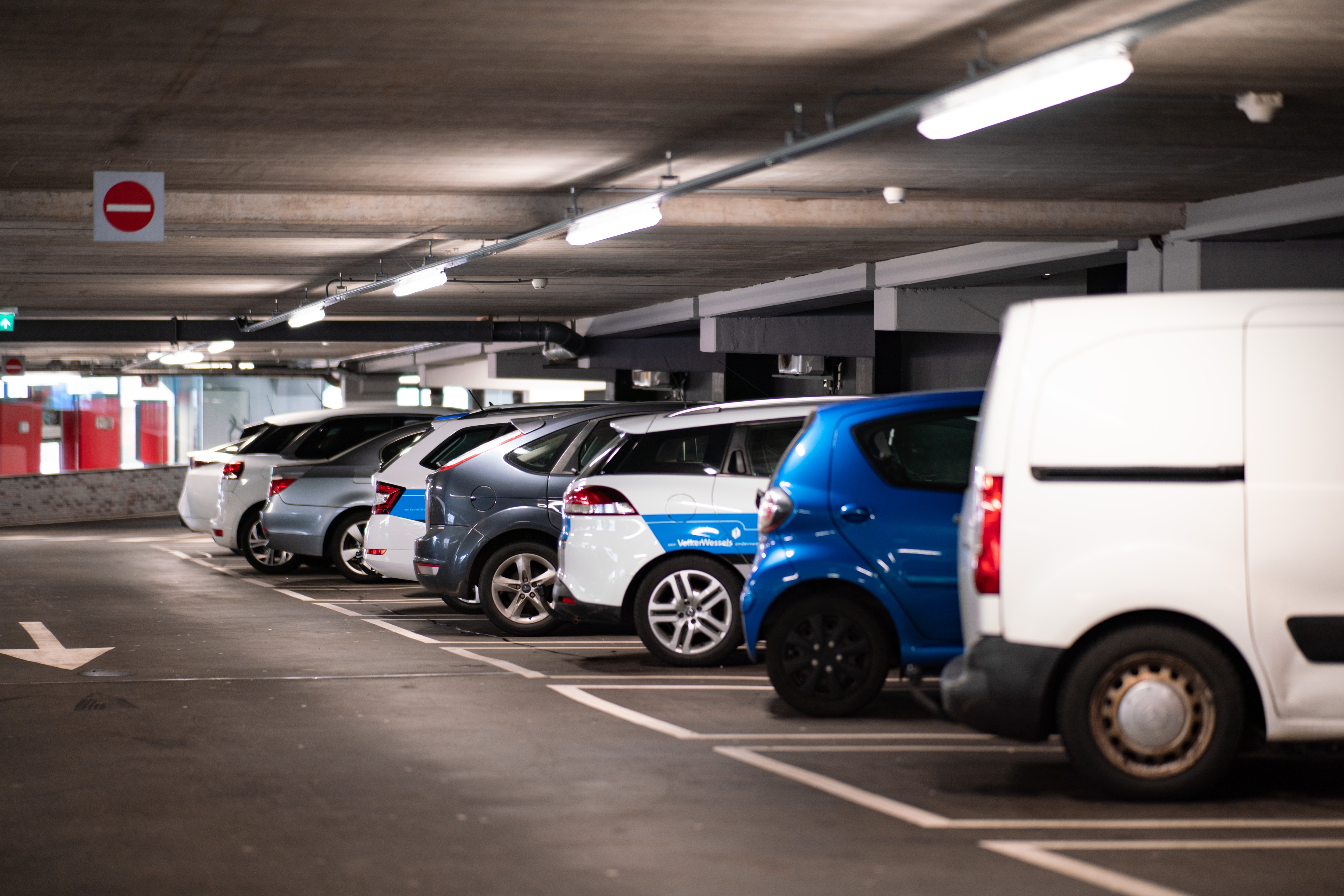 Photo of a row of cars parked in a car park