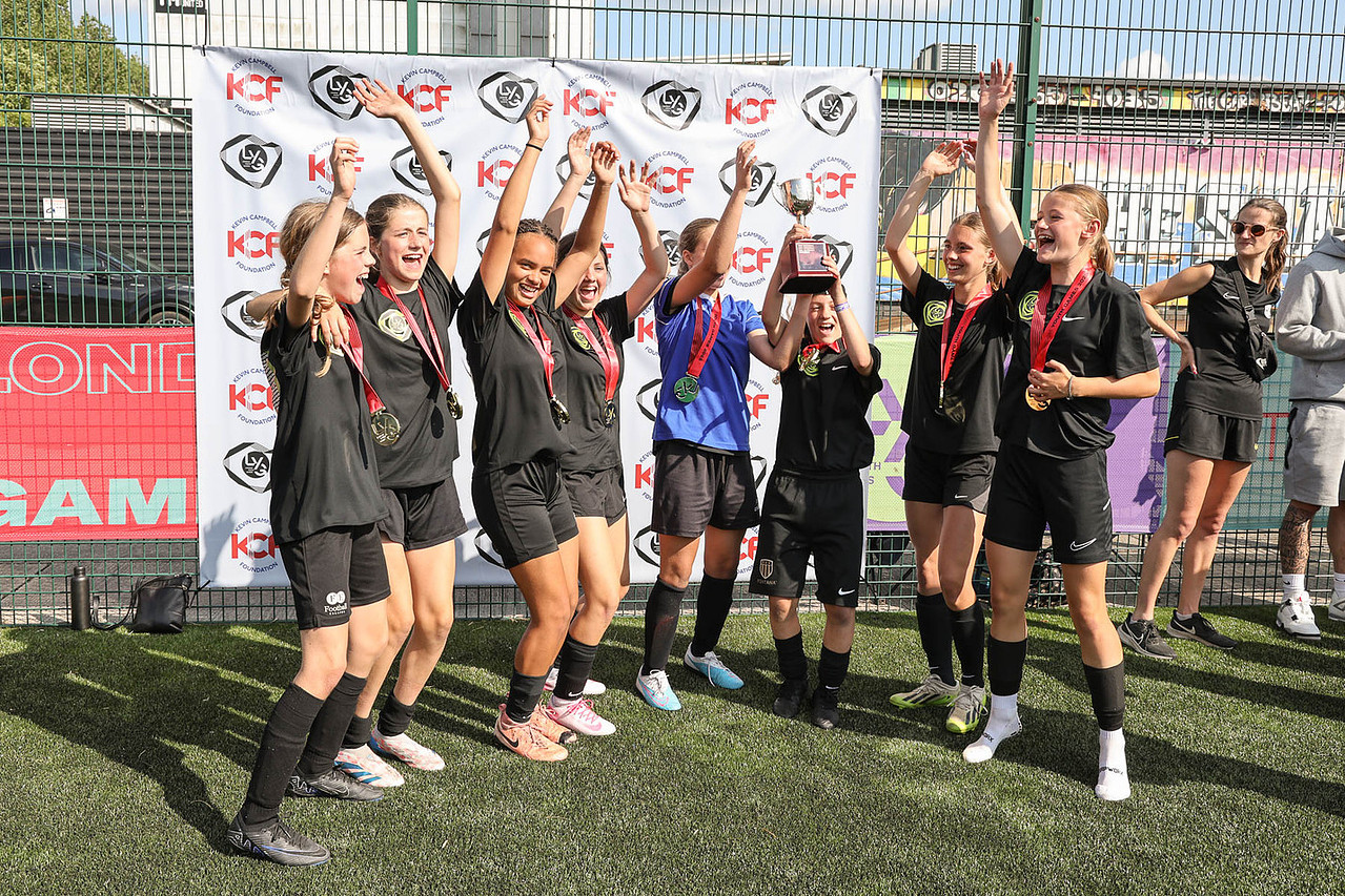 Team Kingston girls football team celebrate their win